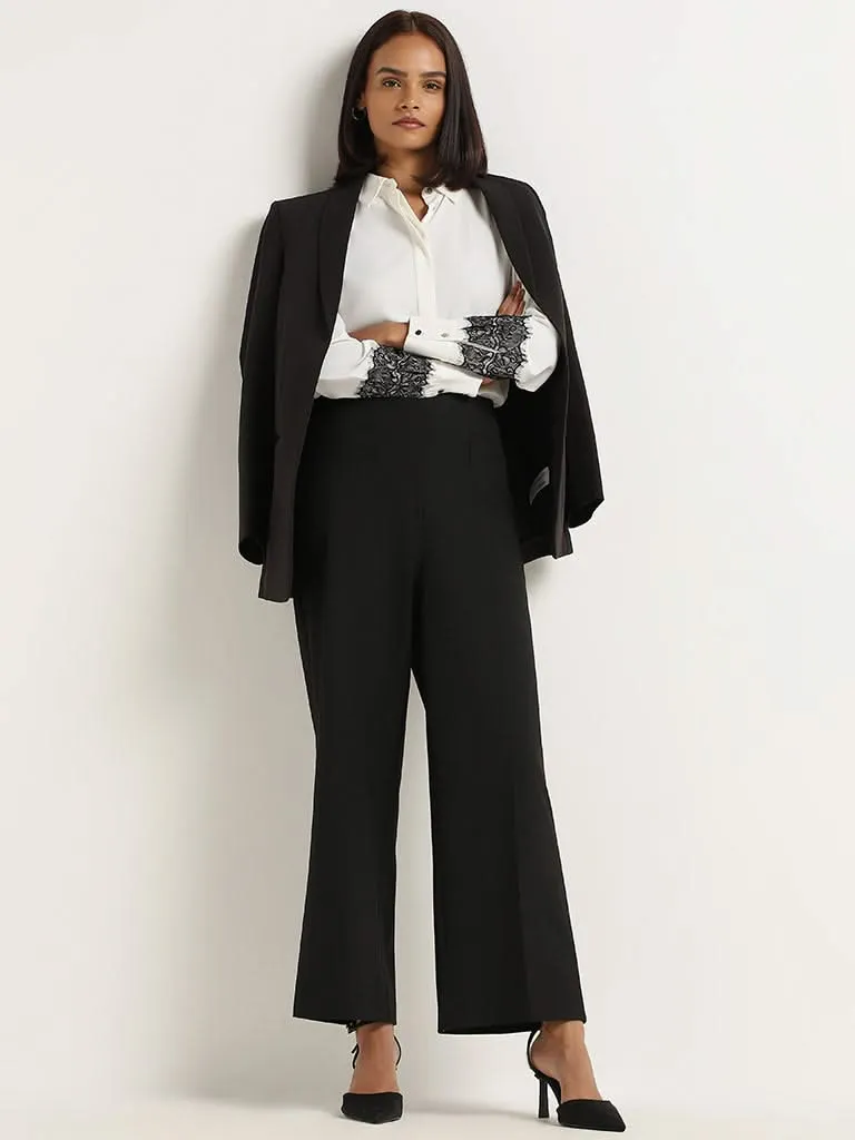 Wardrobe Black Self-Patterned Trousers